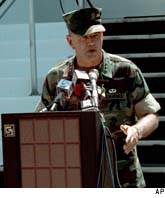 Lt. Gen. Charles Wilhelm, commanding general Marine Corps Forces Atlantic speaks at a press conference at Cherry Point, N.C. Saturday, May 11, 1996 concerning the mid-air collision between two U.S. Marine Corps helicopters Friday. (AP)
